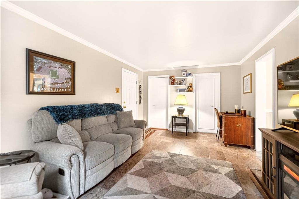 158 Market Street Beaver, PA 15009 - Photo 24 of 38 a living room with furniture and a flat screen tv