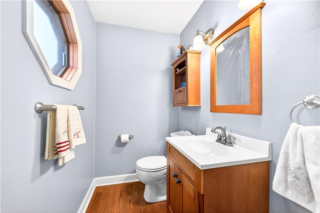 158 Market Street Beaver, PA 15009 - Photo 25 of 38 a bathroom with a toilet sink and mirror