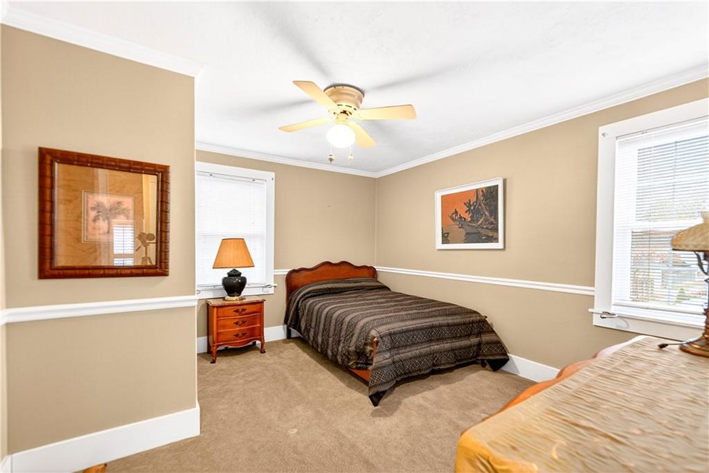 158 Market Street Beaver, PA 15009 - Photo 32 of 38 a bedroom with a bed and a window