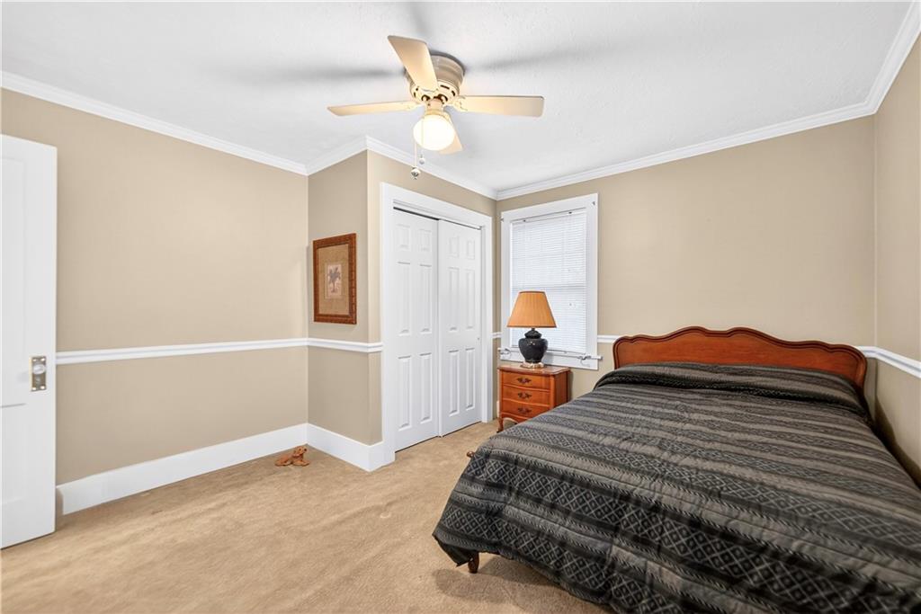 158 Market Street Beaver, PA 15009 - Photo 33 of 38 a bedroom with a bed and a ceiling fan