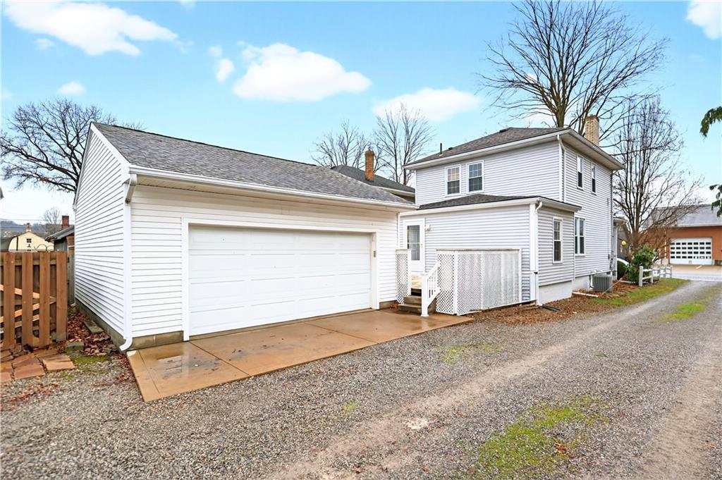 158 Market Street Beaver, PA 15009 - Photo 37 of 38 a view of a house with a yard and garage