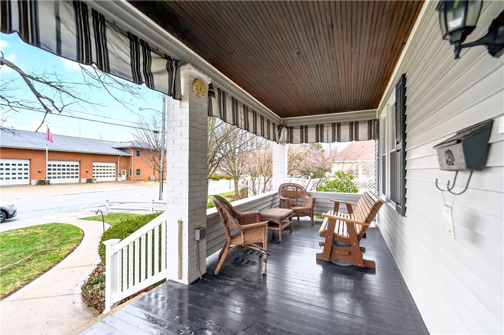 158 Market Street Beaver, PA 15009 - Photo 5 of 38 a view of a porch with furniture and garden