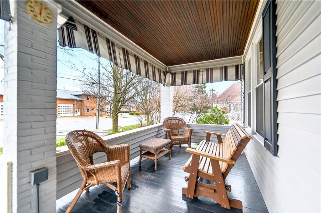 158 Market Street Beaver, PA 15009 - Photo 6 of 38 a view of a porch with furniture and a yard