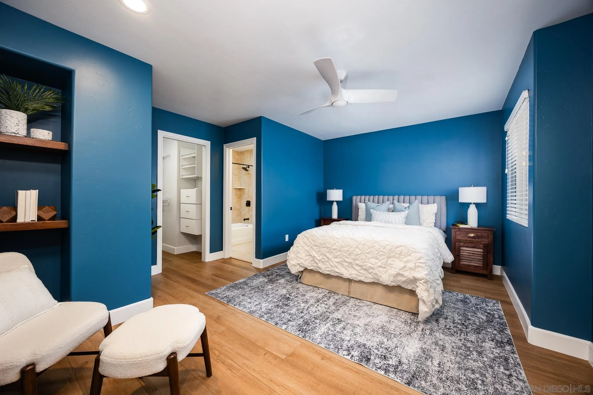 3986 Riviera Drive San Diego, CA 92109 - Photo 20 of 35 a bedroom with a bed and a table in it