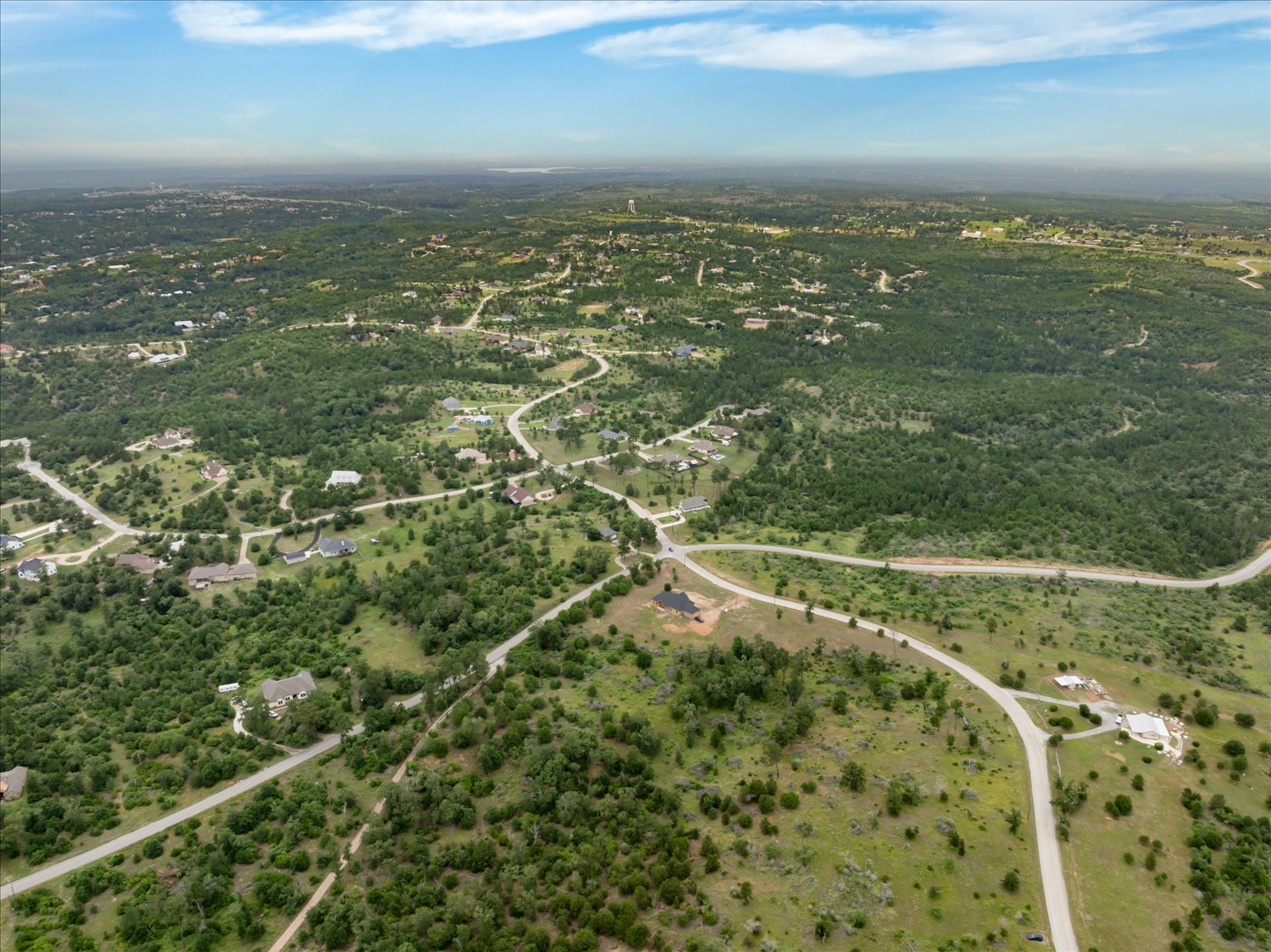 0 McAllister Road Bastrop, TX 78602 - Photo 5 of 12 Rolling hills and ample green space define this vibrant community, offering serene living.