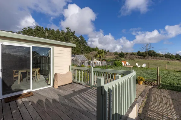 a view of a roof deck with couches