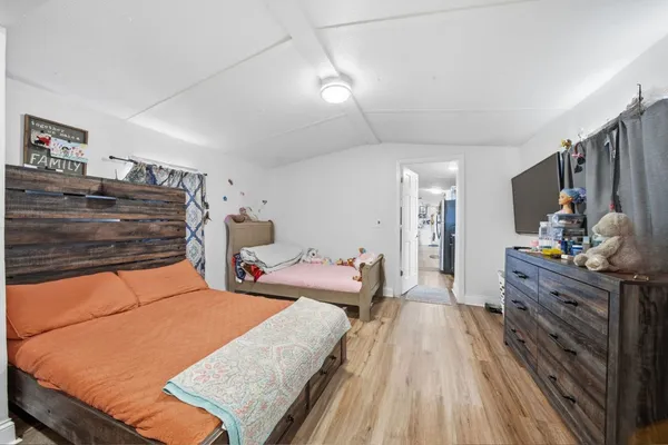 a bathroom with a sink toilet a mirror and vanity
