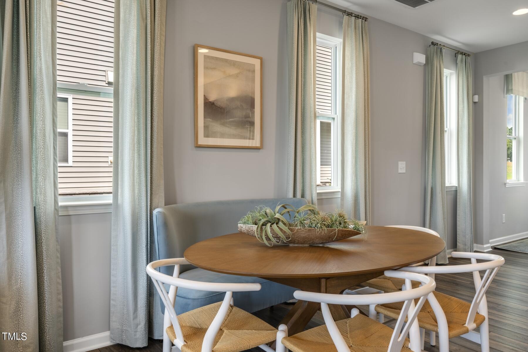 168 Siebold Street Garner, NC 27529 - Photo 24 of 59 a view of a dining room with furniture and window