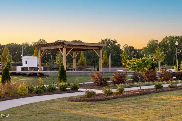 a view of a swimming pool with a yard