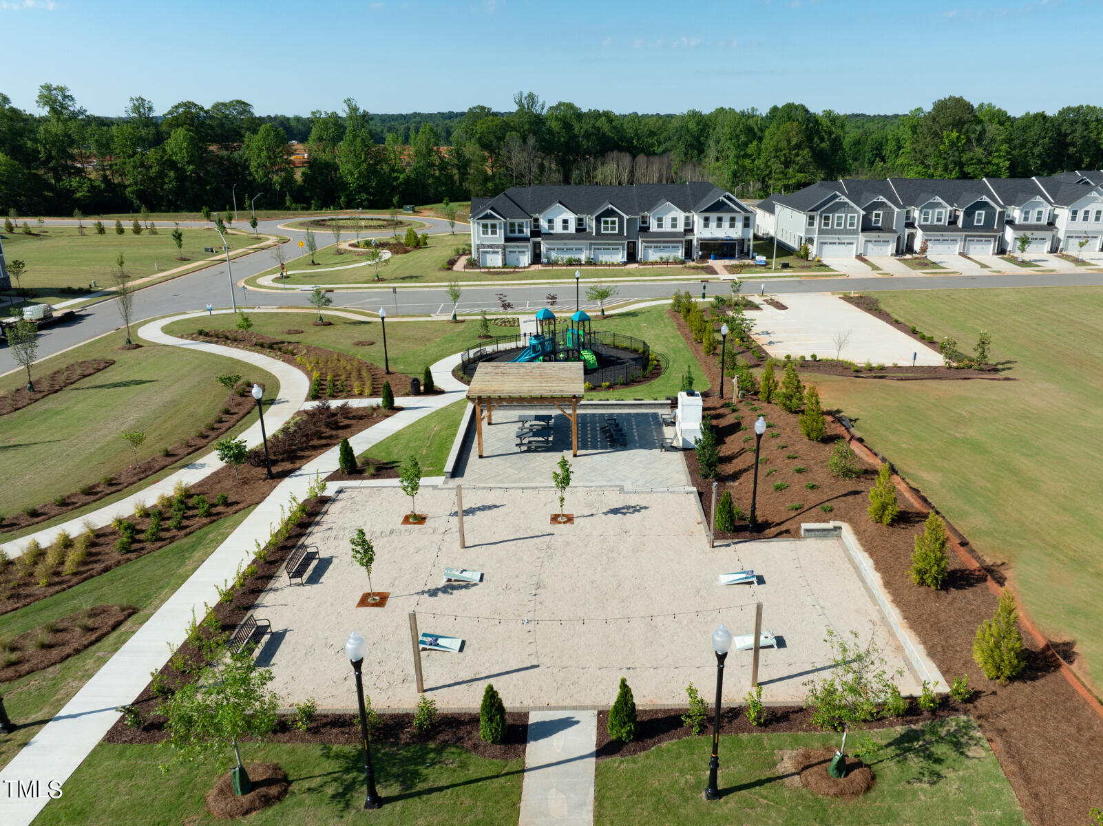168 Siebold Street Garner, NC 27529 - Photo 51 of 59 a view of a swimming pool with outdoor seating and lake view