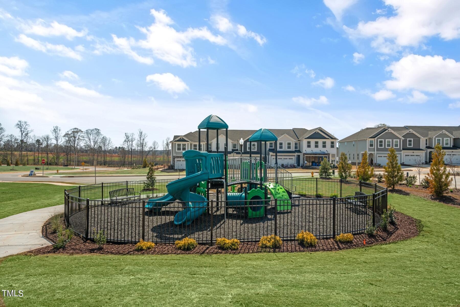 168 Siebold Street Garner, NC 27529 - Photo 54 of 59 a view of a house with a yard and sitting area
