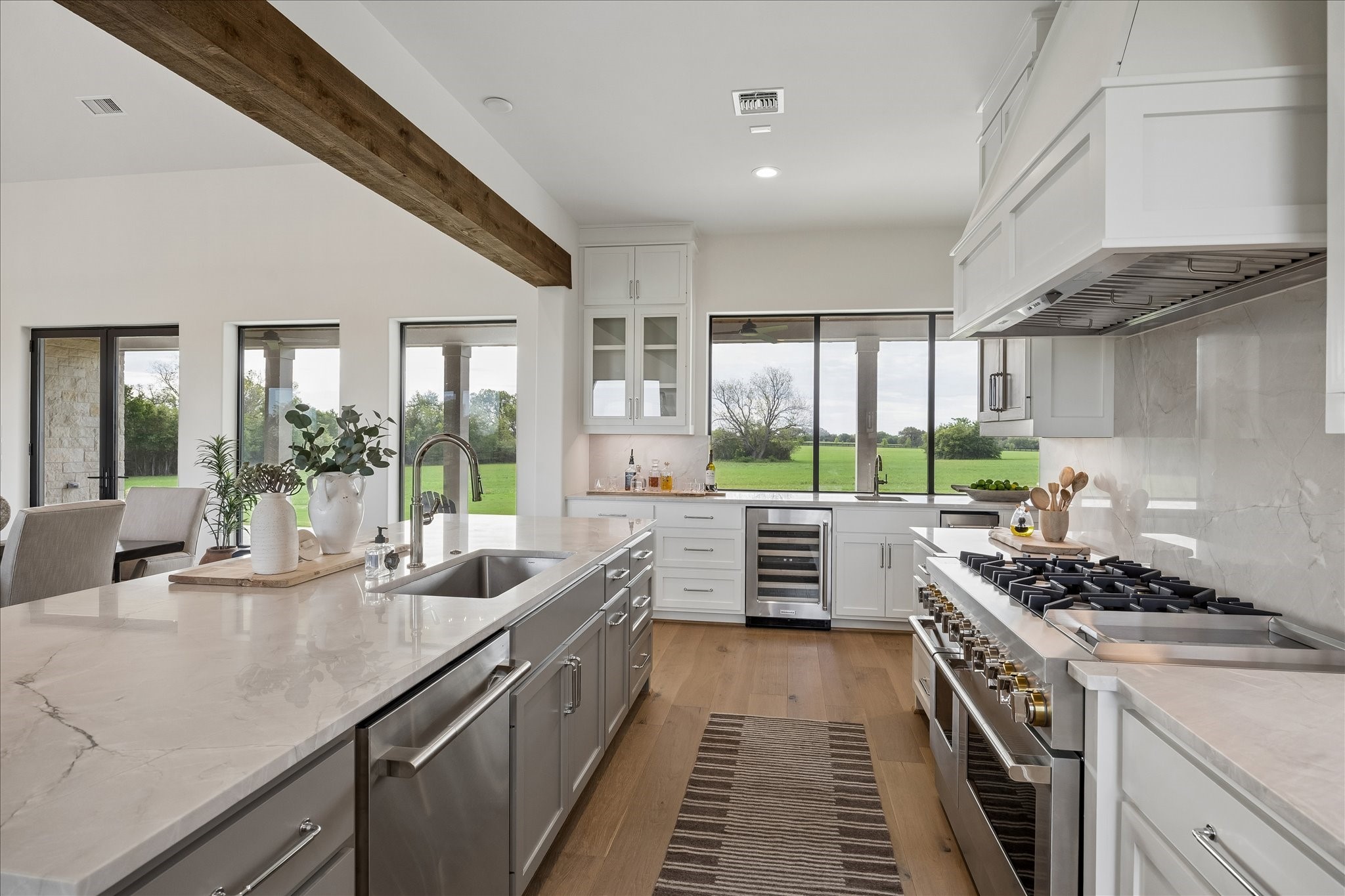 4961 Hartfield Road Round Top, TX 78954 - Photo 11 of 33 a kitchen with stove and cabinets
