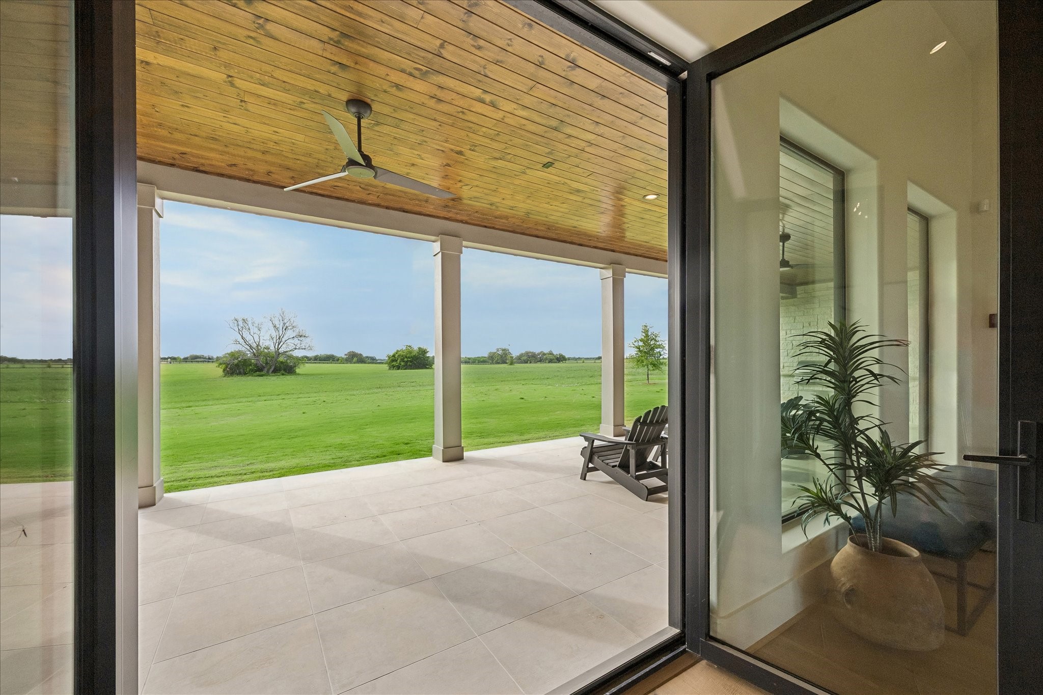 4961 Hartfield Road Round Top, TX 78954 - Photo 13 of 33 a view of a garden from a windows