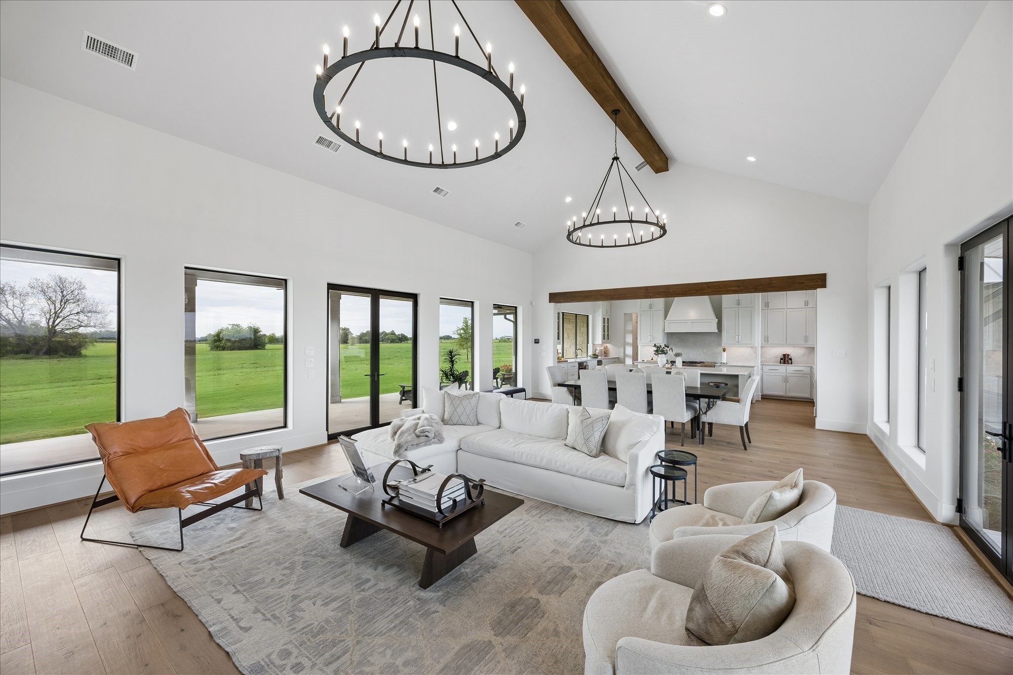4961 Hartfield Road Round Top, TX 78954 - Photo 26 of 33 a living room with furniture and a large window