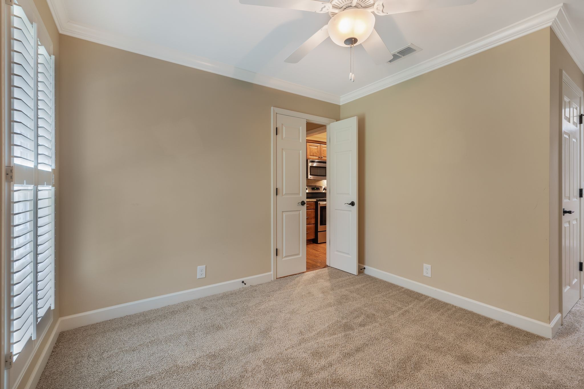 3259 Mershon Drive Murfreesboro, TN 37128 - Photo 17 of 21 an empty room with a ceiling fan and window