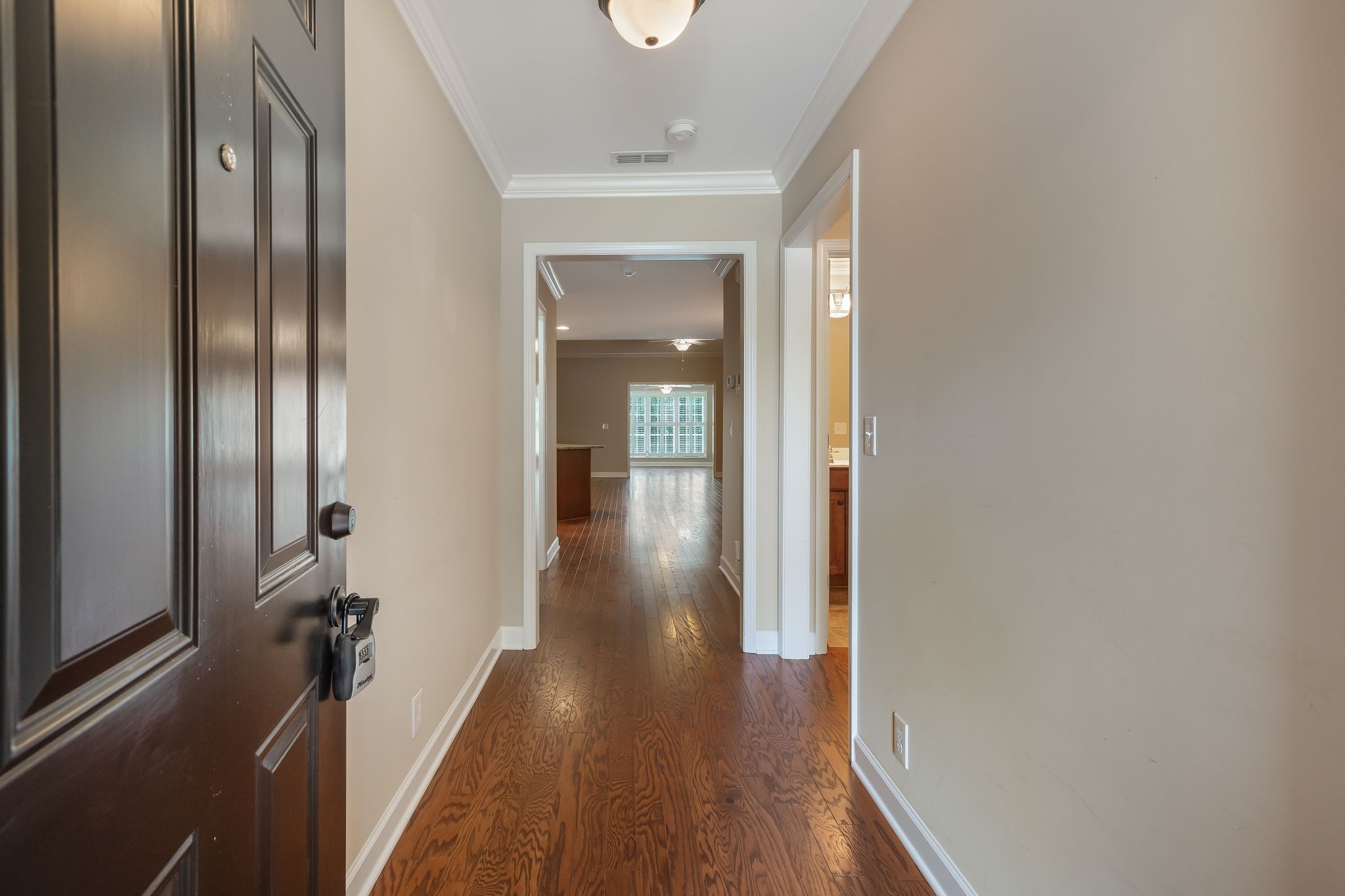 3259 Mershon Drive Murfreesboro, TN 37128 - Photo 2 of 21 a view of a hallway with wooden floor