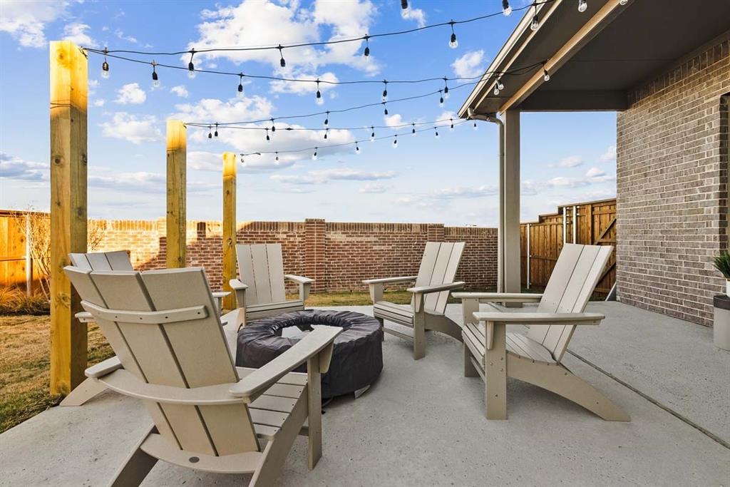 1439 Canadian Lane Van Alstyne, TX 75495 - Photo 18 of 21 a view of a terrace with chairs
