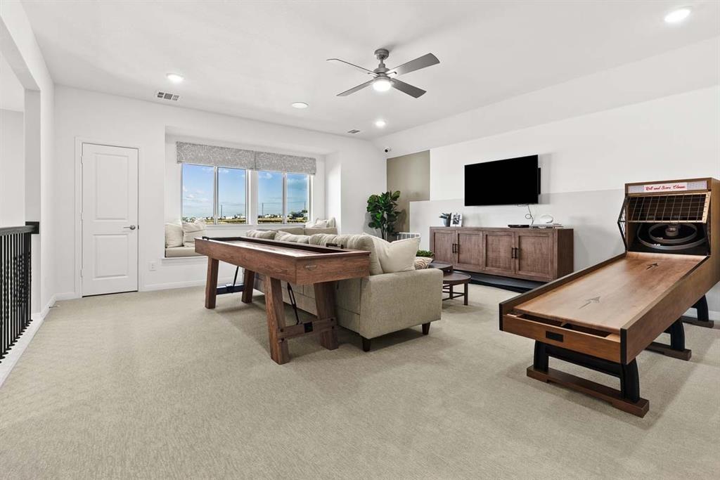 1439 Canadian Lane Van Alstyne, TX 75495 - Photo 21 of 21 a living room with furniture and a flat screen tv