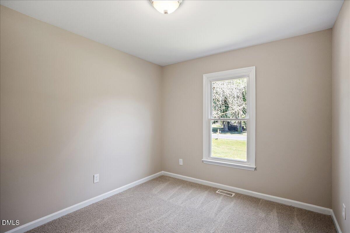31 Fieldview Court Angier, NC 27501 - Photo 20 of 25 an empty room with a window