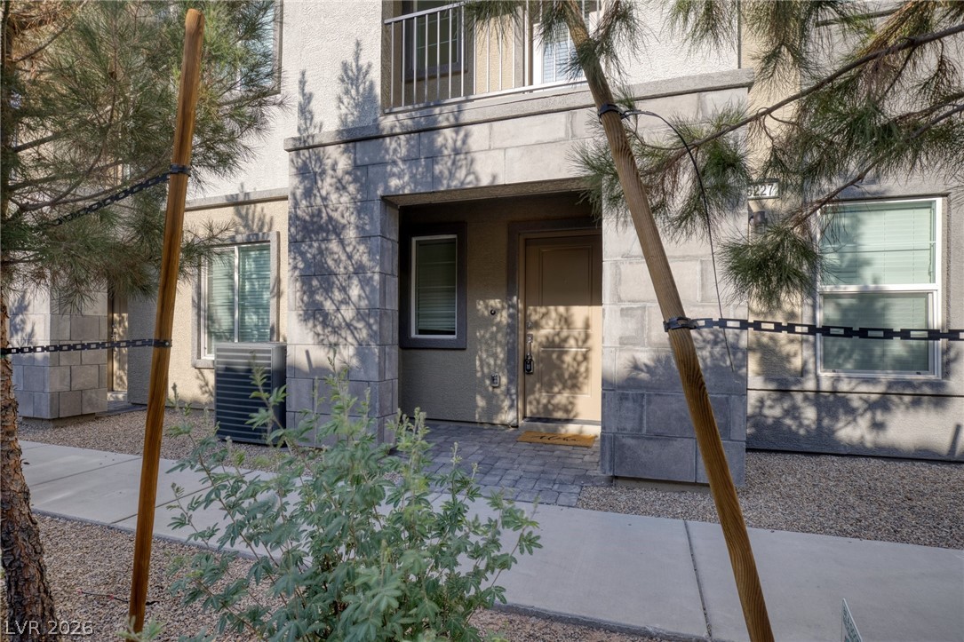 6227 Runestone Street Las Vegas, NV 89113 - Photo 2 of 33 This charming residence features a classic exterior with modern details, welcoming you home.