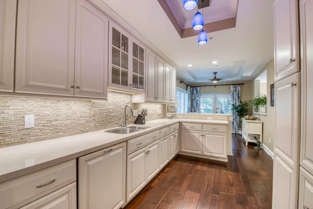 a outdoor space with a large window and furniture