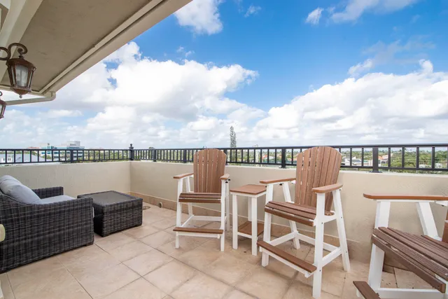 a view of a patio with swimming pool