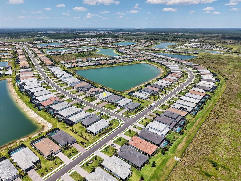 18412 Ridgeline Drive Estero, FL 33928 - Photo 39 of 50 a view of a city with an ocean view