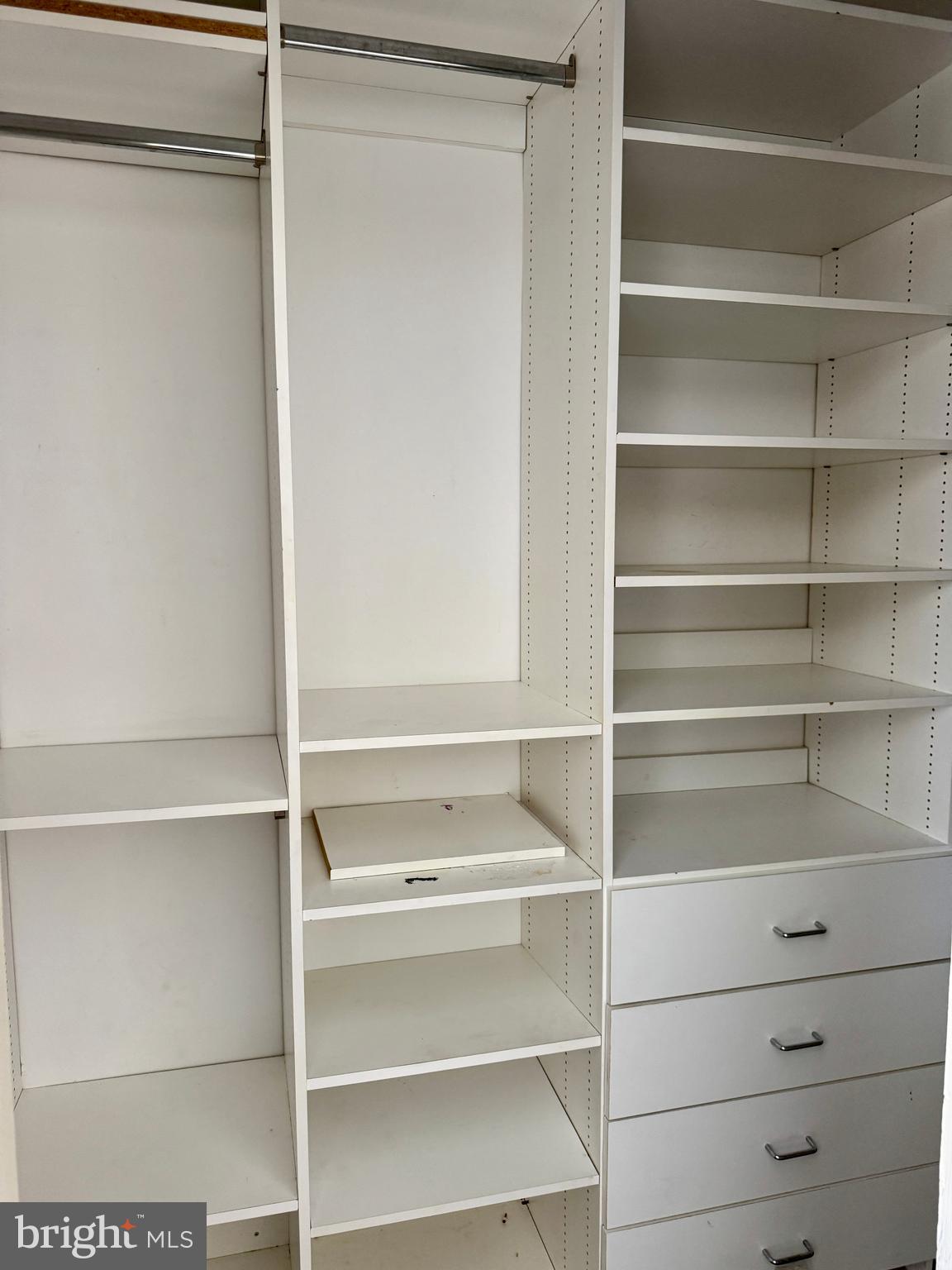 8233 Fairview Road Elkins Park, PA 19027 - Photo 17 of 36 a view of walk in closet with empty racks