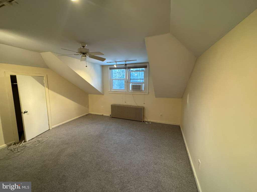 8233 Fairview Road Elkins Park, PA 19027 - Photo 27 of 36 an empty room with a empty space and windows