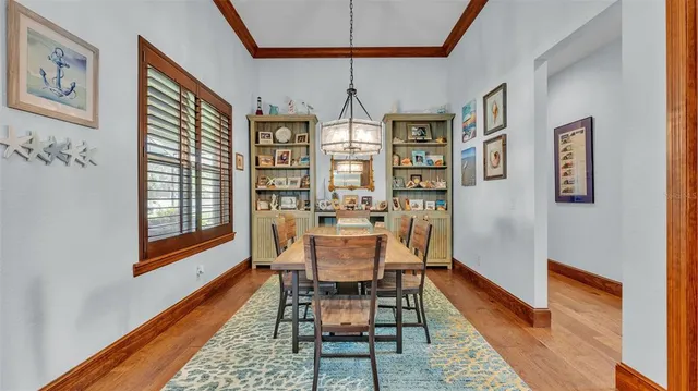 a view of a dining room with furniture
