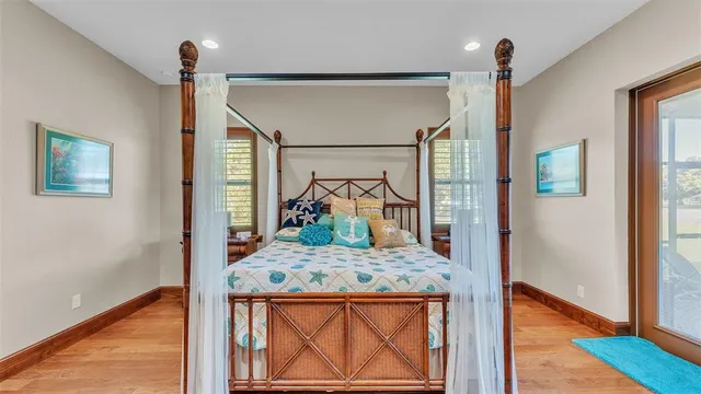 a view of walk in closet with clothes