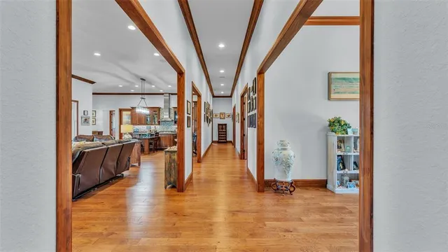 a bathroom with a granite countertop sink and a window