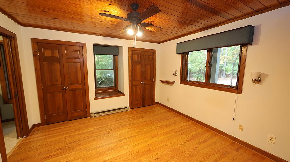 2413 Pleasant Union Church Road Raleigh, NC 27614 - Photo 16 of 30 Nice closets and window seat that contains a cedar-lined storage area. 1st Fl Master Bedroom
