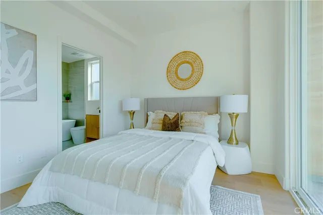 a bathroom with a sink a bathtub and a window
