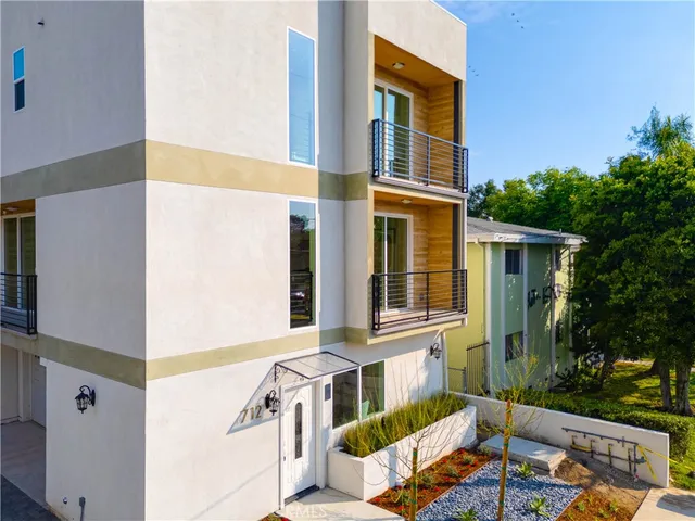 an aerial view of residential house with outdoor space