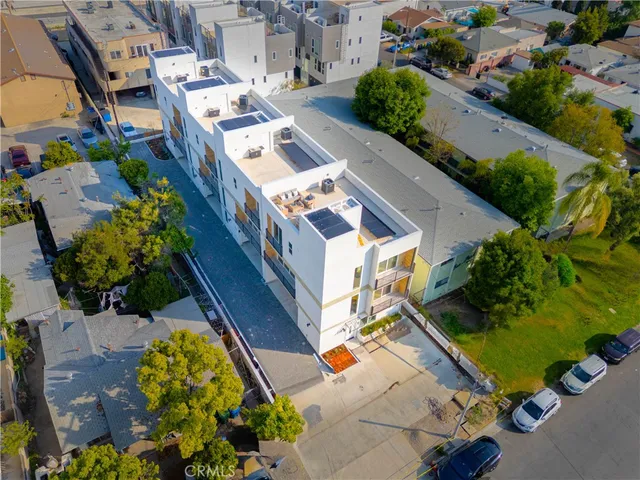 an aerial view of a house with a garden