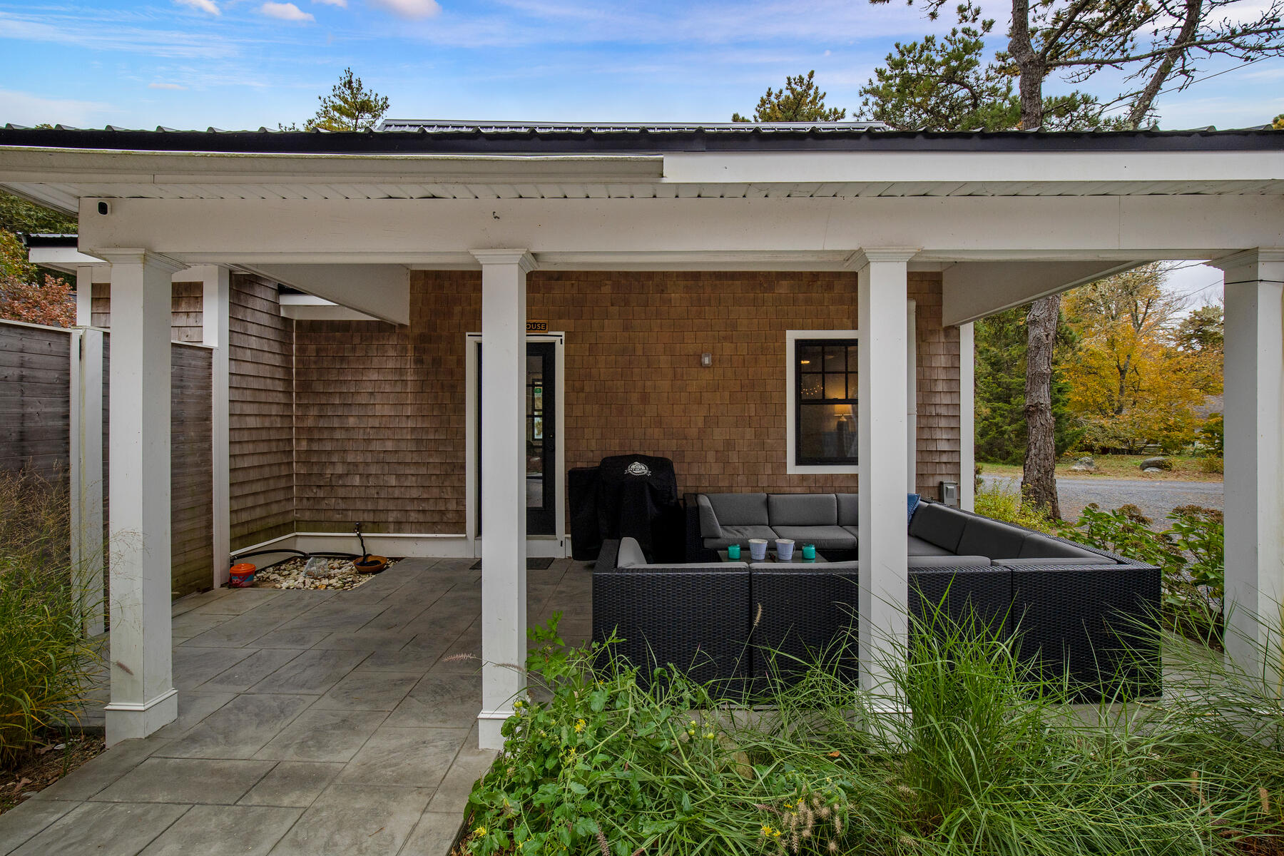 262 Old Wharf Road, Unit 87 Dennis Port, MA 02639 - Photo 7 of 39 front view of a house with a porch