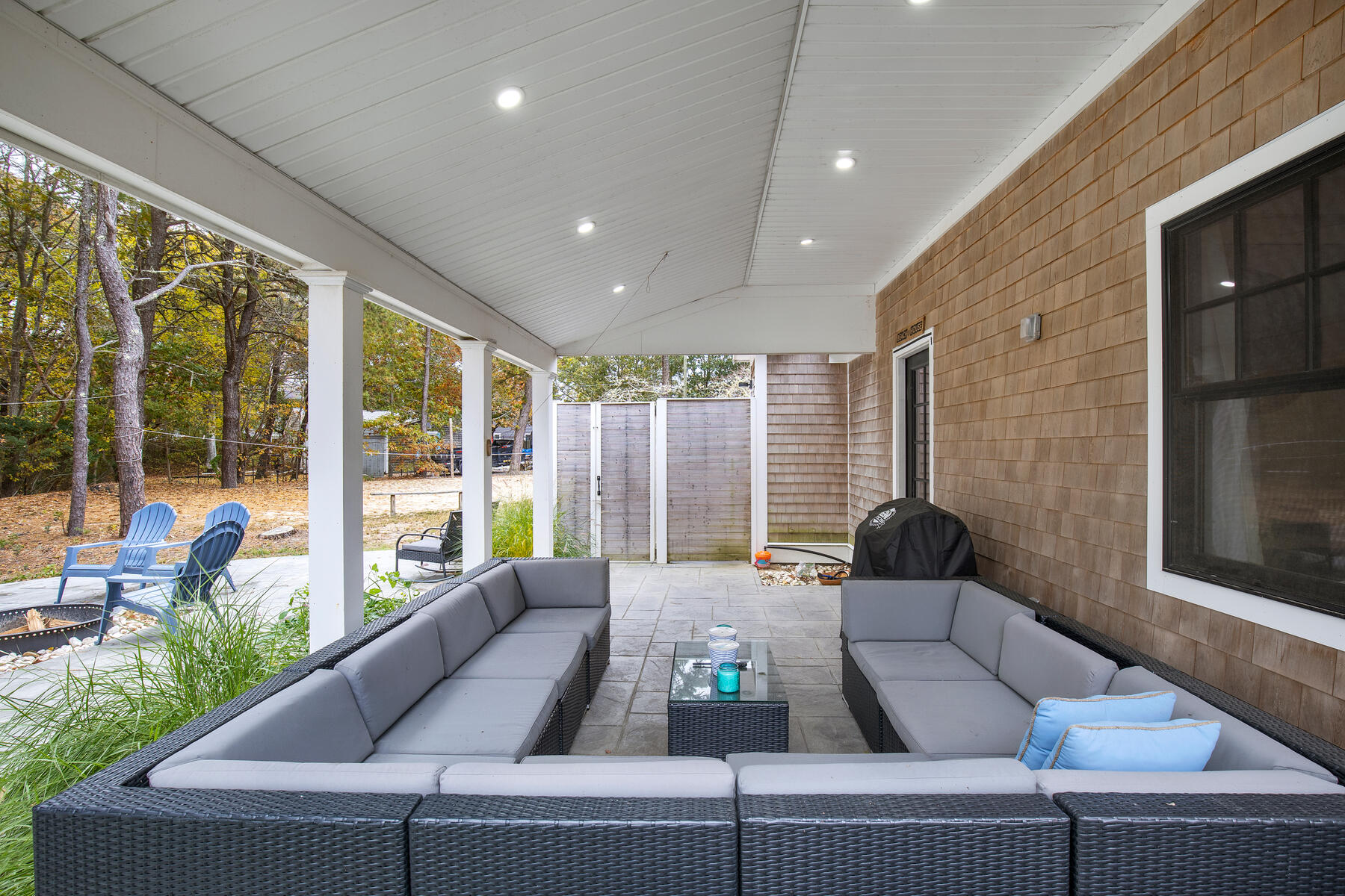 262 Old Wharf Road, Unit 87 Dennis Port, MA 02639 - Photo 8 of 39 a living room with furniture and large windows