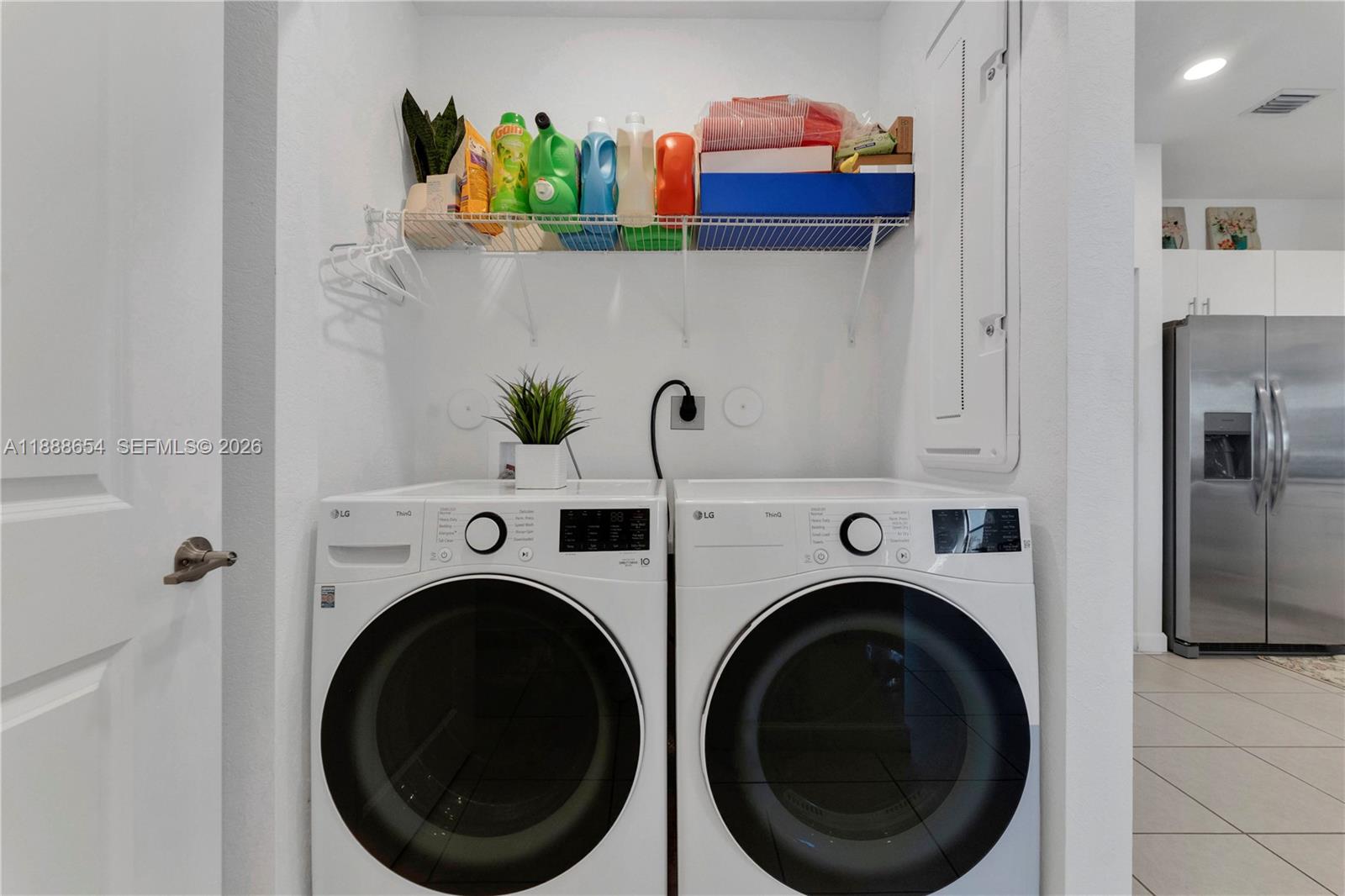 23512 Southwest 129th Path Homestead, FL 33032 - Photo 20 of 39 a utility room with dryer and washer