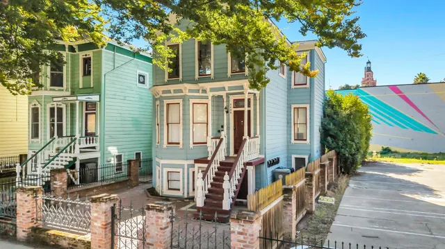 a view of a house with a street