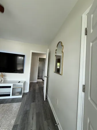 a view of a livingroom with a flat screen tv