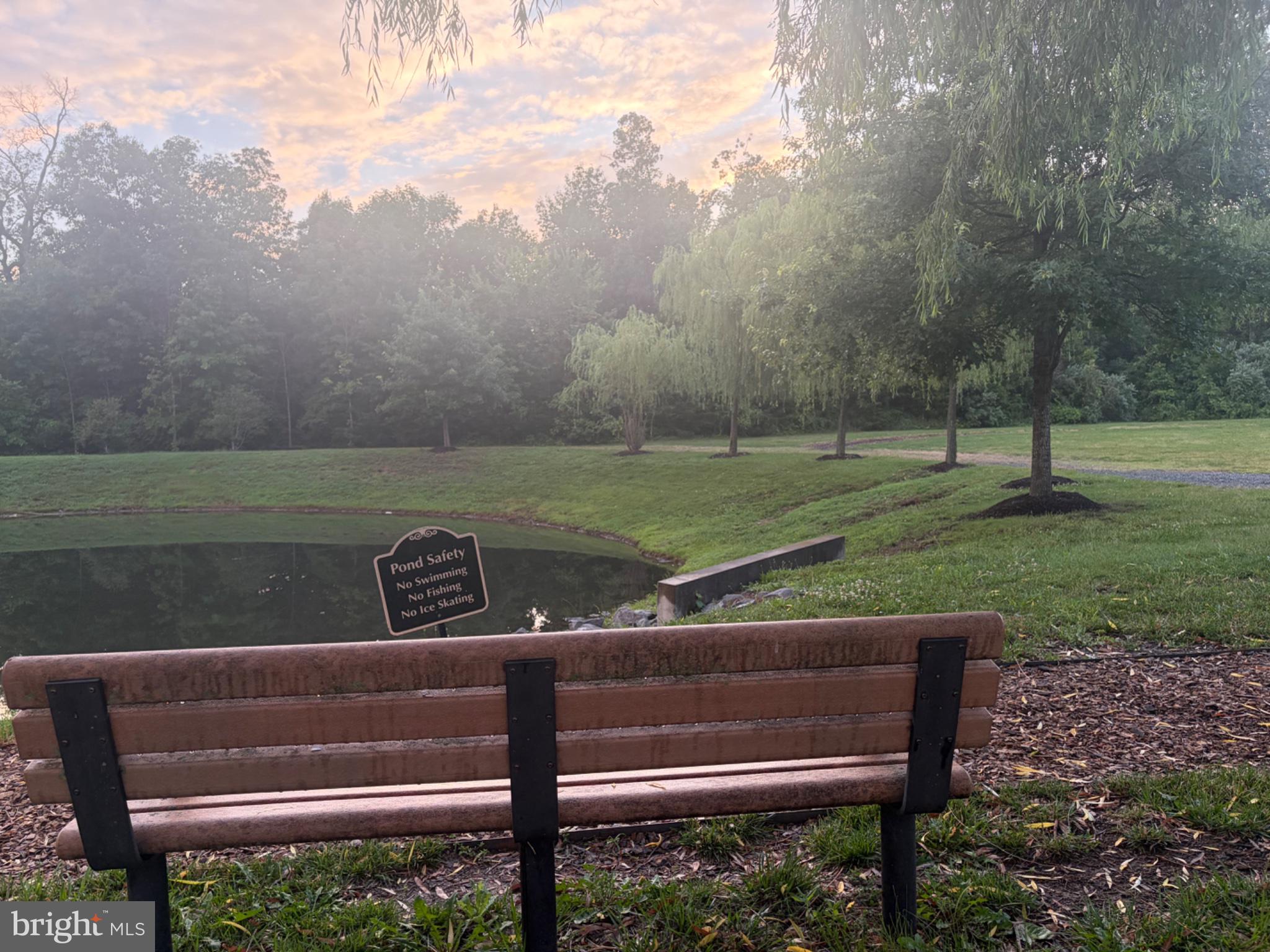25333 Wakestone Terrace Chantilly, VA 20152 - Photo 109 of 109 Tranquil park bench by the pond.