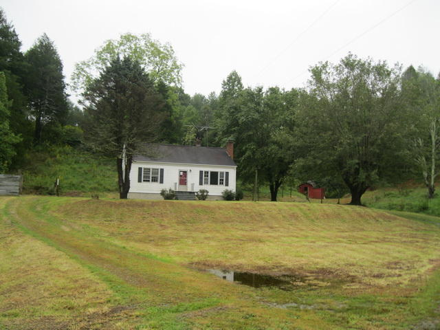 73 Highland Farm Road Callaway, VA 24067 - Photo 3 of 17 a front view of a house with a yard