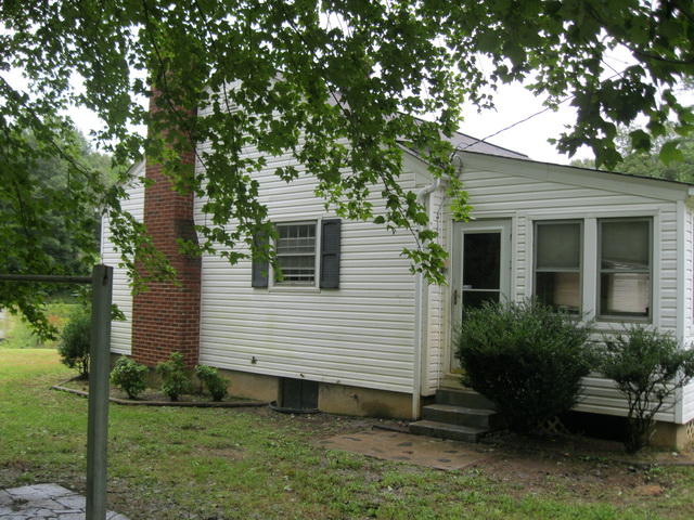 73 Highland Farm Road Callaway, VA 24067 - Photo 5 of 17 a view of a house with backyard and garden