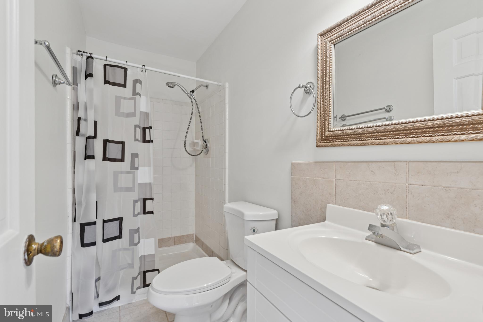 17 Providence Avenue Doylestown, PA 18901 - Photo 21 of 25 Modern bathroom with sleek finishes.