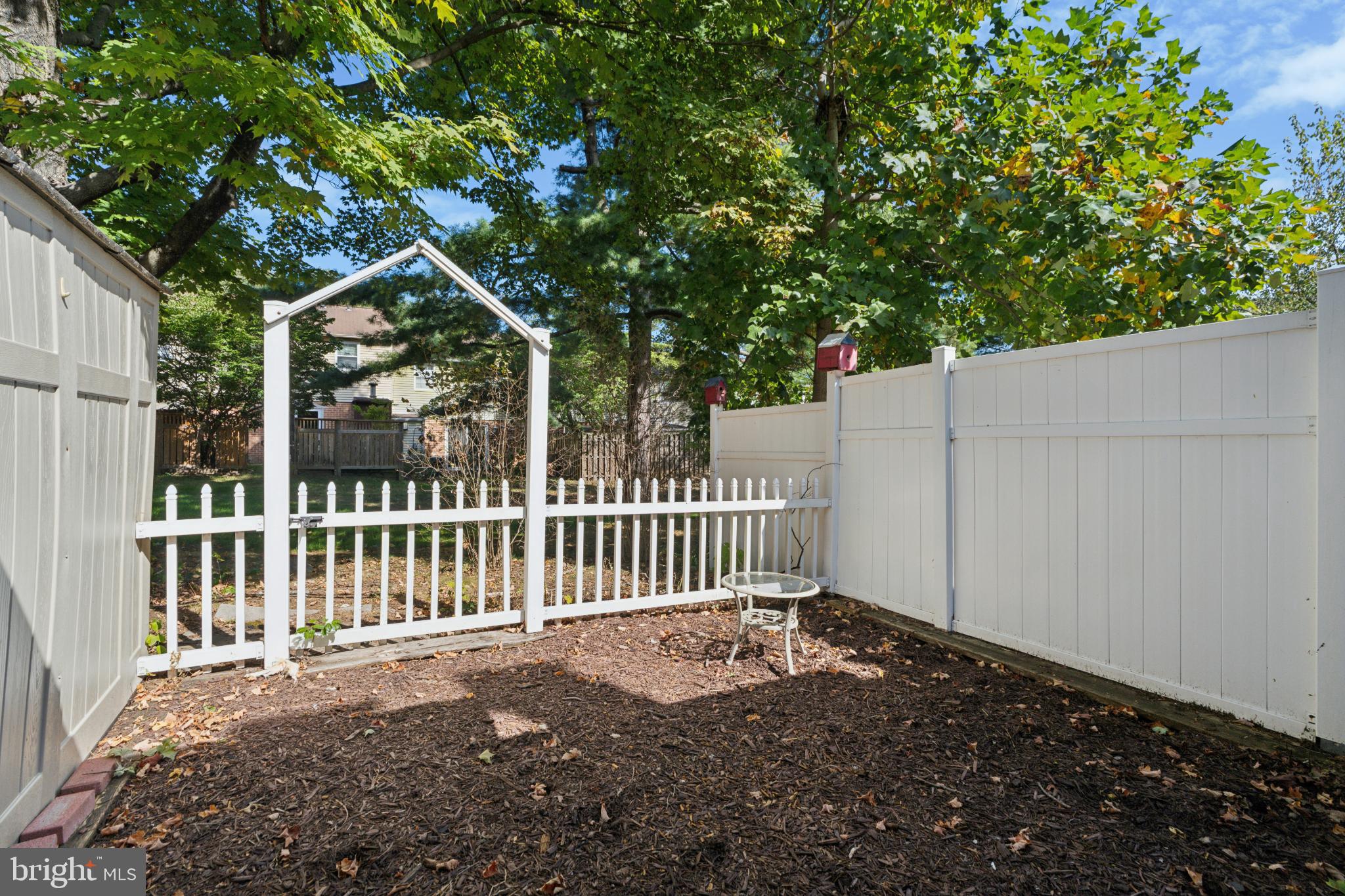 17 Providence Avenue Doylestown, PA 18901 - Photo 23 of 25 Charming fenced yard with lush greenery.