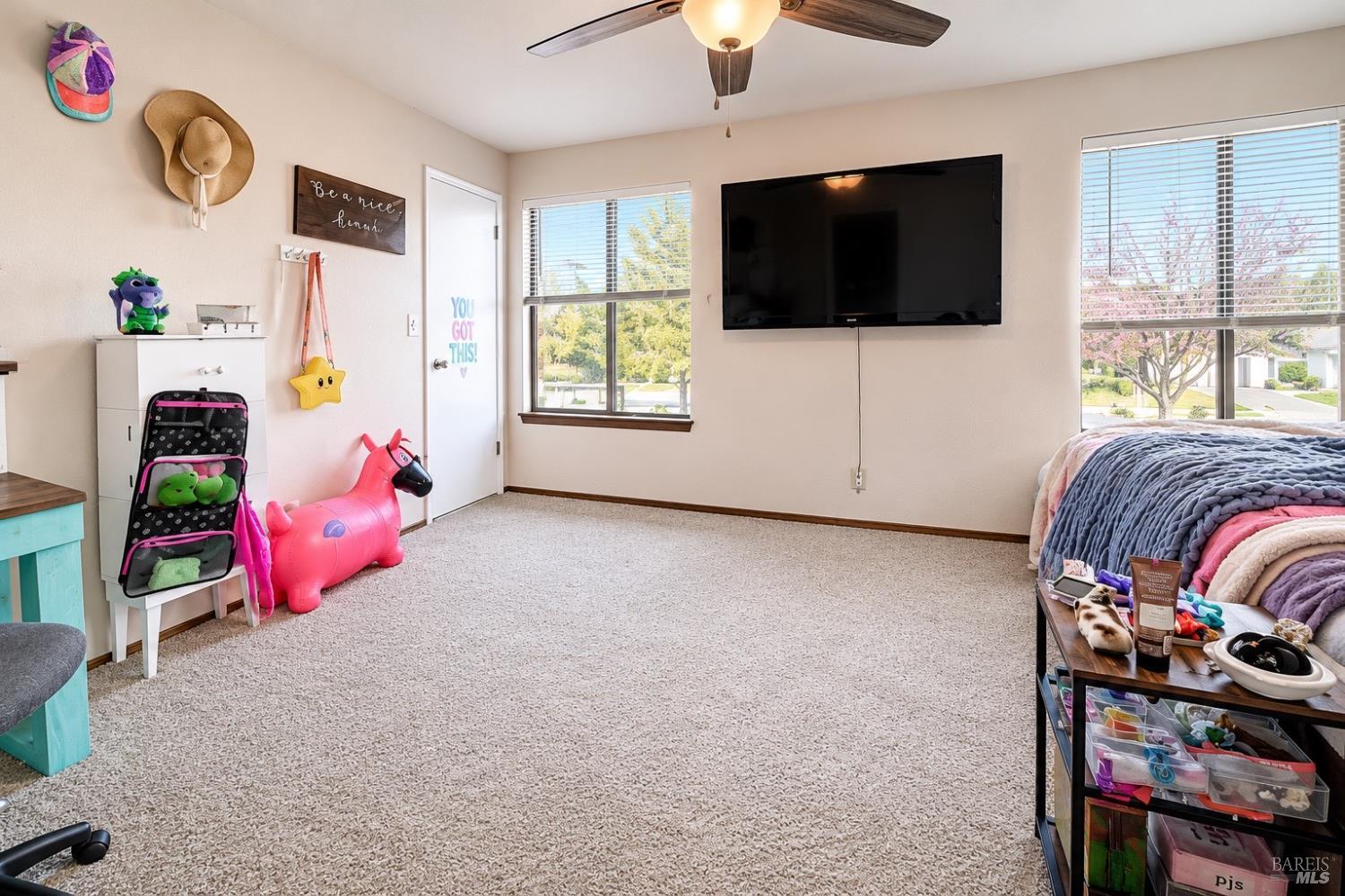 989 Suffolk Way Fairfield, CA 94533 - Photo 17 of 30 a bedroom with furniture and a flat screen tv