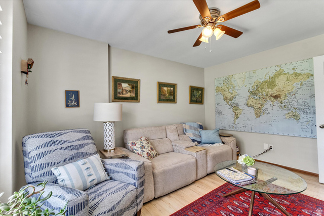 2863 Fallentine Road Sandy, UT 84093 - Photo 27 of 48 Interior room featuring wood-finish flooring and light neutral wall tones