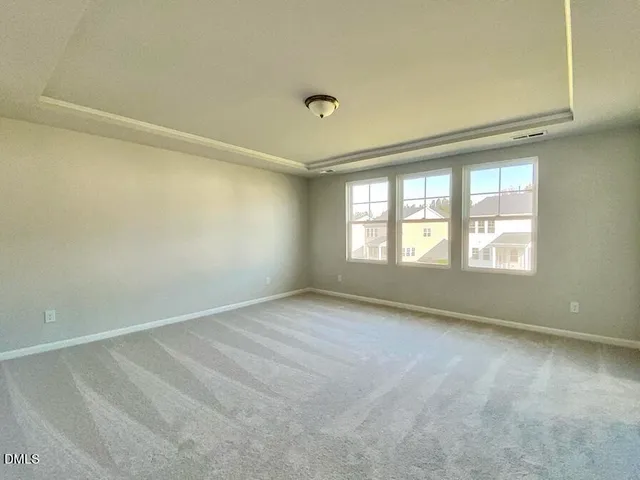 a view of a room with shelf on the wall
