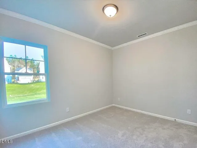 a kitchen with cabinets and stainless steel appliances